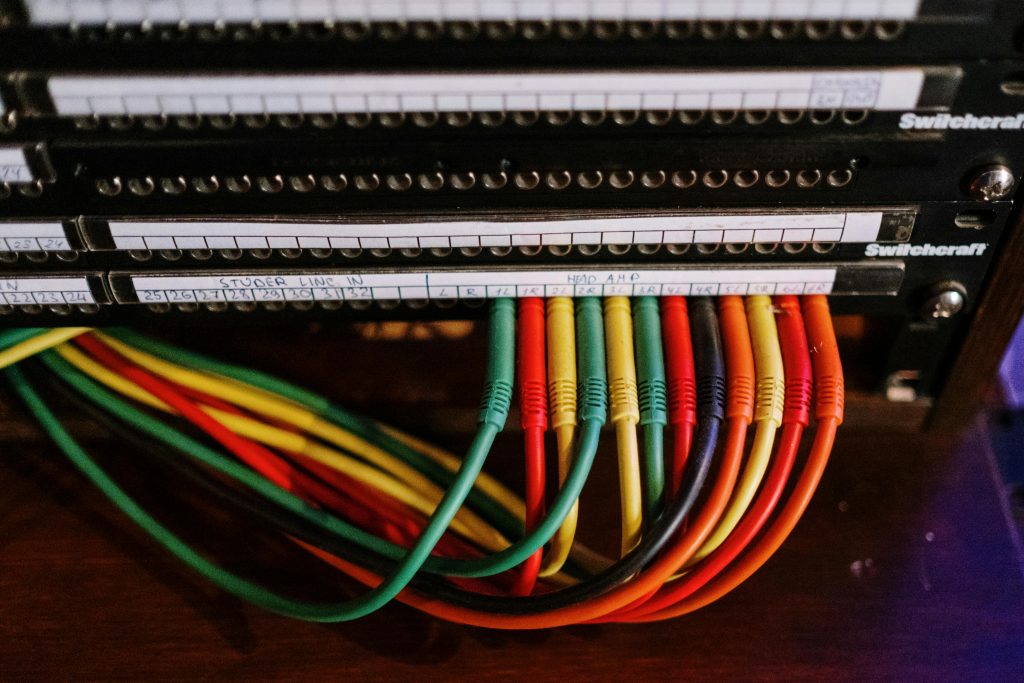 IT technician managing structured cabling system